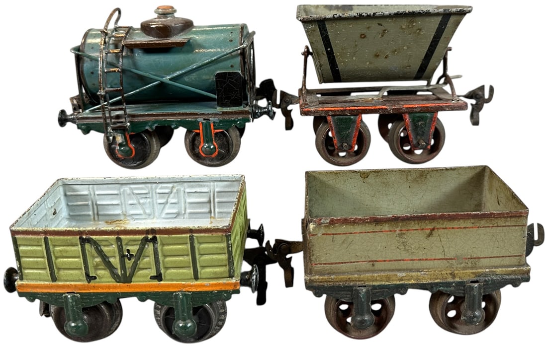 MARKLIN GAUGE 1 FREIGHT CARS: 227. MARKLIN GAUGE 1 FREIGHT CARS | Gauge 1, hand painted, gondola has Gamage's badge on one end. | 4.5" l. | (Very Good to Excellent Condition) | $250 - $500