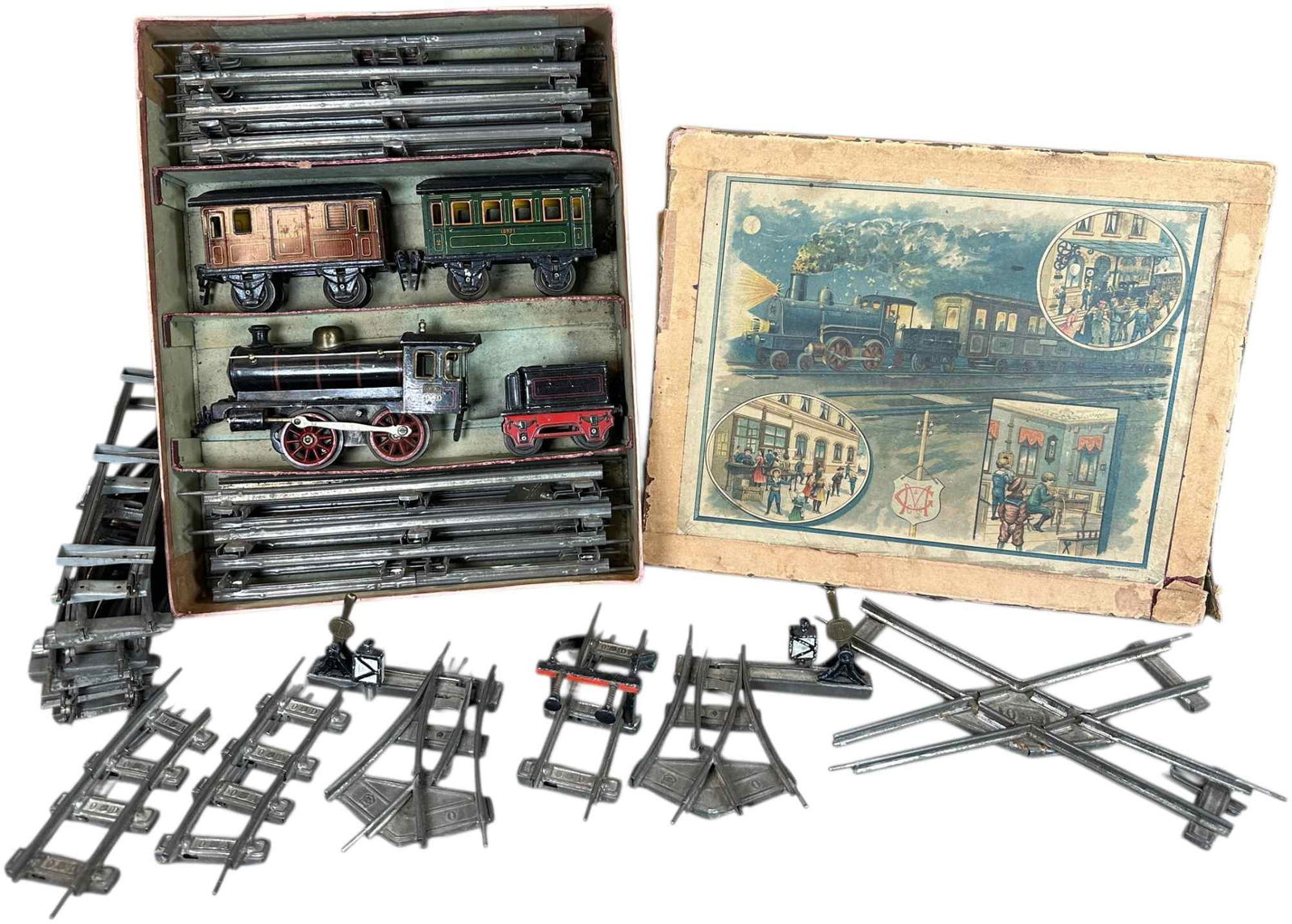 BOXED MARKLIN PASSENGER TRAIN SET: 228. BOXED MARKLIN PASSENGER TRAIN SET | 0 gauge, wind-up. | Overall (Excellent Condition) with expected amount of wear. | $500 - $1,000