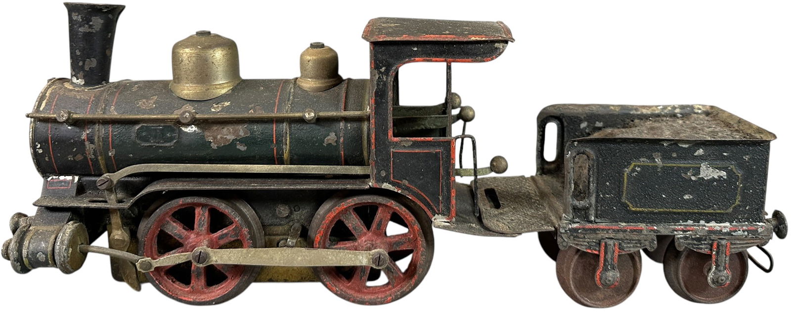 MARKLIN GAUGE 2 CLOCKWORK LOCOMOTIVE: 229. MARKLIN GAUGE 2 CLOCKWORK LOCOMOTIVE | Gauge 2, clockwork, hand painted. | 9" l. loco | (Very Good Condition) | $600 - $1,200