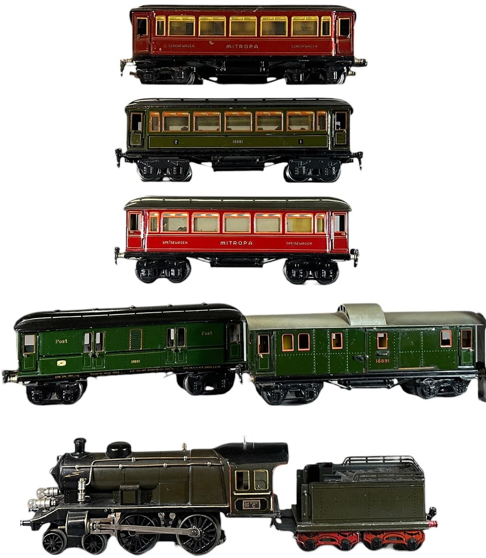 MARKLIN CONTINENTAL PASSENGER TRAIN SET: 232. MARKLIN CONTINENTAL PASSENGER TRAIN SET | Gauge 1, electric, cars have detailed interiors. | 13.5" l. loco | Some repaint to engine, some touch-ups on cars, (Excellent Condition) | $800 - $1,600