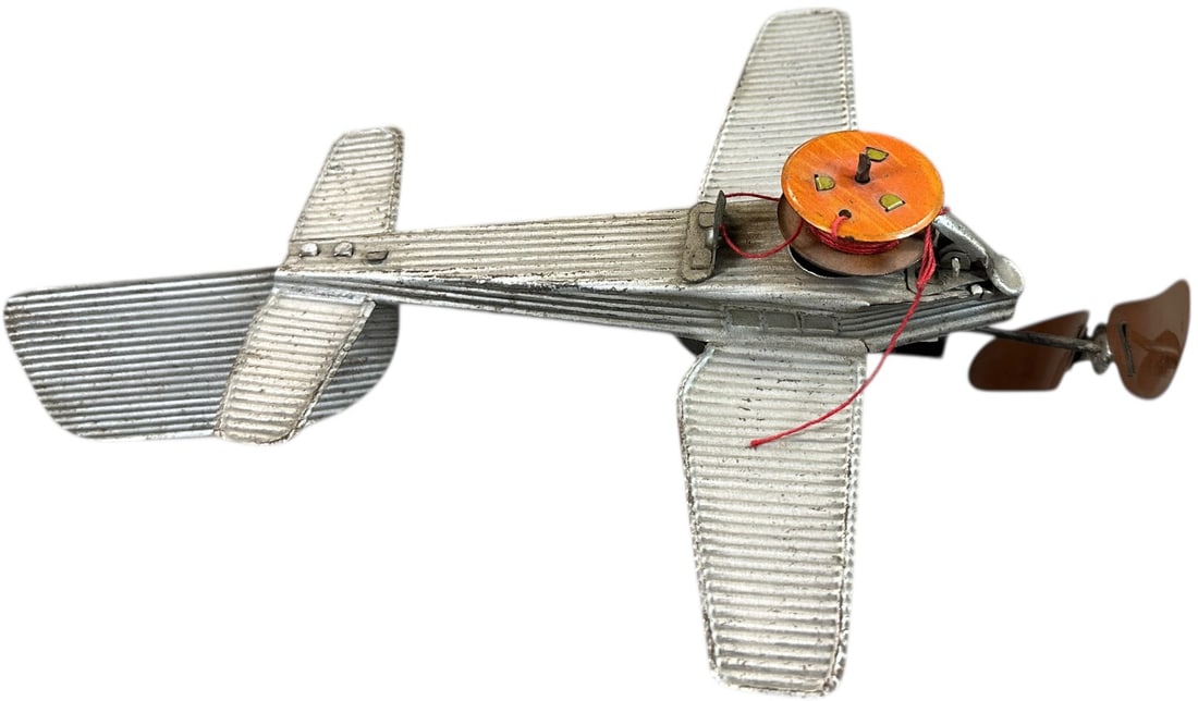 FLEISCHMANN AIRPLANE NO. 3688: 253. FLEISCHMANN AIRPLANE NO. 3688 | Scarce, c. 1930's, with string spool. | 7" wings. | (Excellent Condition) | $500 - $1,000