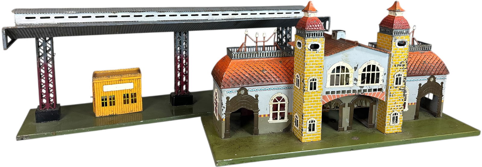 LARGE BING STATION & CANOPY: 278. LARGE BING STATION & CANOPY | Gauge 1, hand painted. | 28 x 7 x 10.5" lwh. | Canopy poles are resecured to base, station has some blended touch-ups, overall (Very Good Condition) | $400 - $800