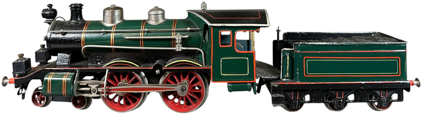 BING EXPRESS LOCOMOTIVE: 283. BING EXPRESS LOCOMOTIVE | Gauge 1, clockwork, hand painted. | 12" l. loco | Wheels on one engine replaced and minor touch-up to red trim, (Very Good to Excellent Condition) | $700 - $1,400