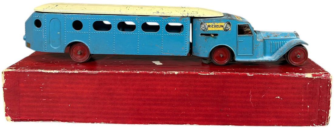 LOUIS ROUSSY RAIL CAR TRAM W/ ORIGINAL BOX: 286. LOUIS ROUSSY RAIL CAR TRAM W/ ORIGINAL BOX | O gauge, electric, Type 5 c. 1937. | 15.5" l. | Some minor spots of touch-up on rear of cab, superficial cracks to side of cab, overall (Very Good to