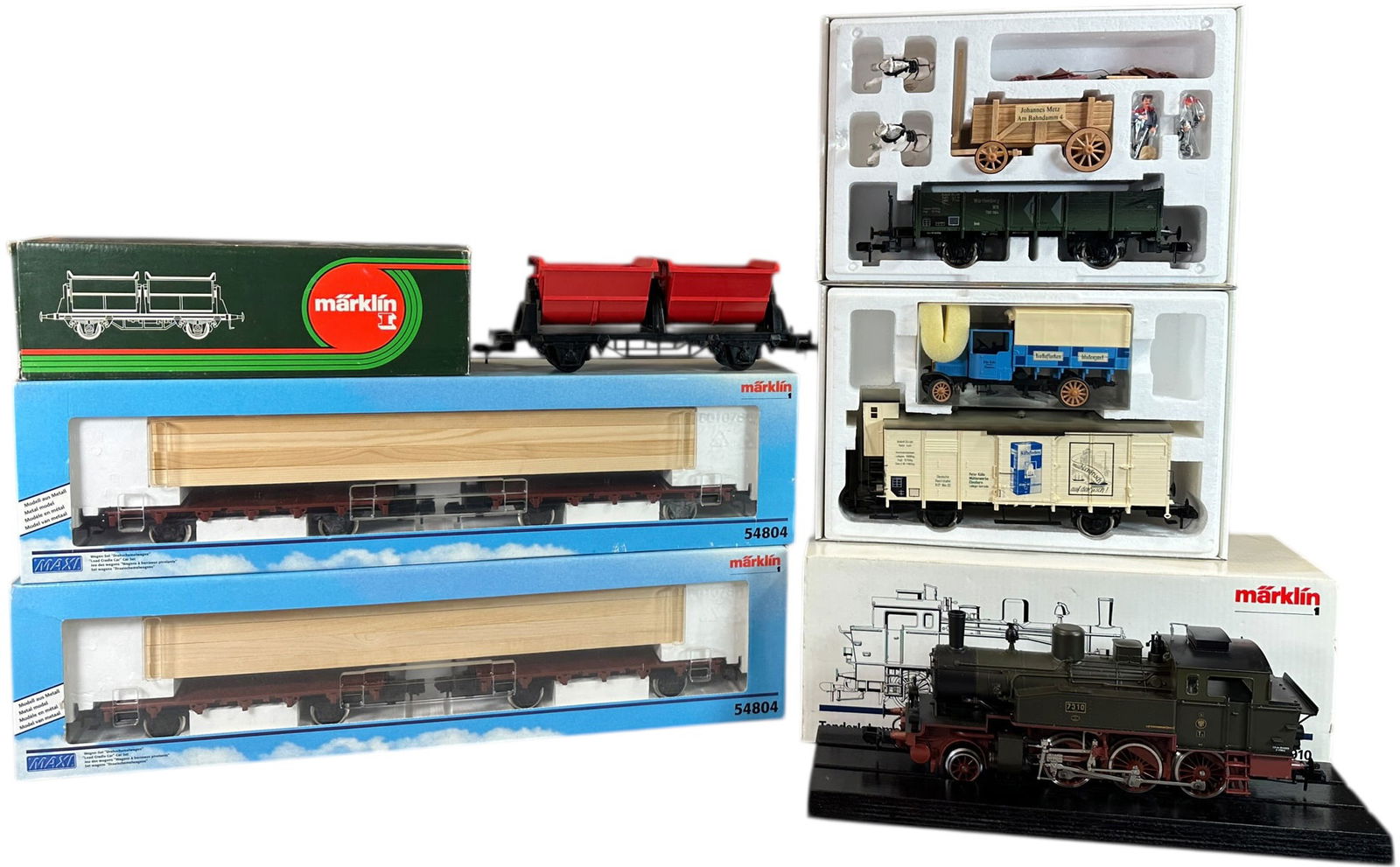 ASSORTED BOXED MARKLIN TRAIN SETS: 297. ASSORTED BOXED MARKLIN TRAIN SETS | #55910. | 14" l. loco | (Near Mint Condition) | $300 - $600