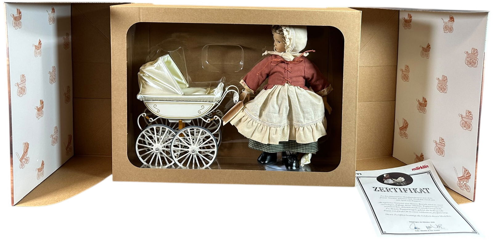 BOXED MARKLIN DOLL CARRIAGE #1611 & HEIDI OTT: 310. BOXED MARKLIN DOLL CARRIAGE #1611 & HEIDI OTT | 16" l. | Authentic Marklin re-issue, (Near Mint Condition) | $200 - $400