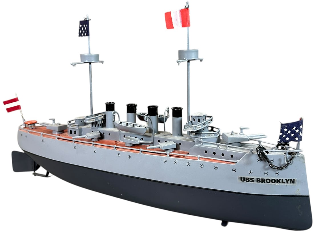 BING ARMORED CRUISER BATTLESHIP: 317. BING ARMORED CRUISER BATTLESHIP | Germany, circa 1912-1914, clockwork motor version. | 20" l. | Repainted throughout, (Very Good to Excellent Condition) | $600 - $1,000