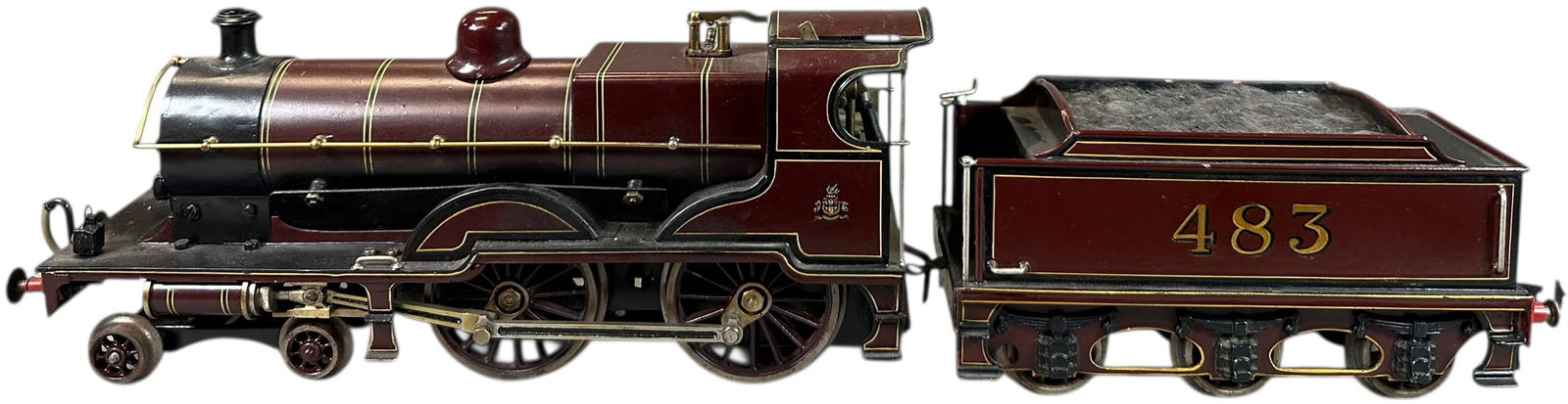 MARKLIN LMS COMPOUND LOCOMOTIVE: 343. MARKLIN LMS COMPOUND LOCOMOTIVE | Gauge 1, live steam. | 13" l. loco | Tender original, loco restored, displays in (Excellent Condition) | $1,200 - $2,400