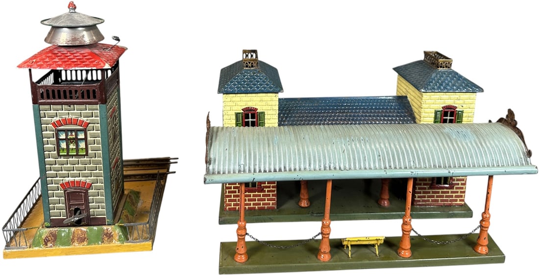EARLY BING STATION W/ KARL BUB BELL TOWER: 349. EARLY BING STATION W/ KARL BUB BELL TOWER | O gauge, hand painted station with rare litho bell tower. | 13" l. | Some touch-up to four canopy poles, Overall (Excellent Condition) | $300 - $600
