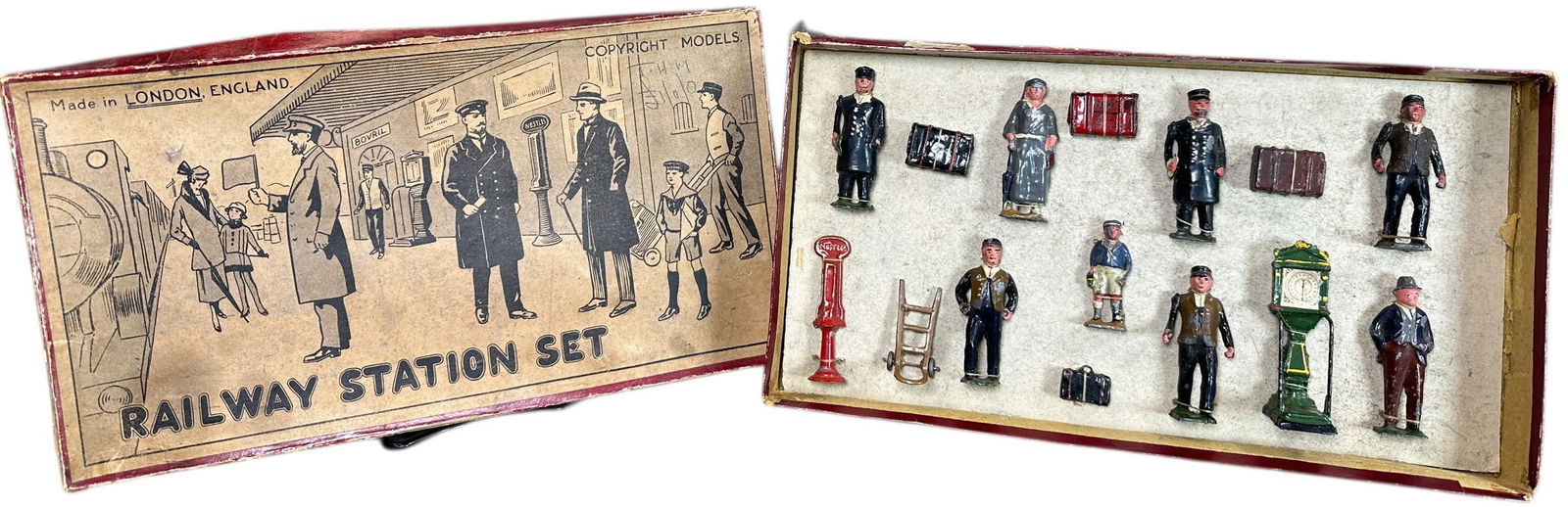 RARE GAUGE 3 PIXYLAND-KEW RAILROAD FIGURE SET: 353. RARE GAUGE 3 PIXYLAND-KEW RAILROAD FIGURE SET | Tough to find in this size, hand painted figures in original box. | 2 3/4" h. | General age-related wear, tape repair to sides of box, overall (Ver