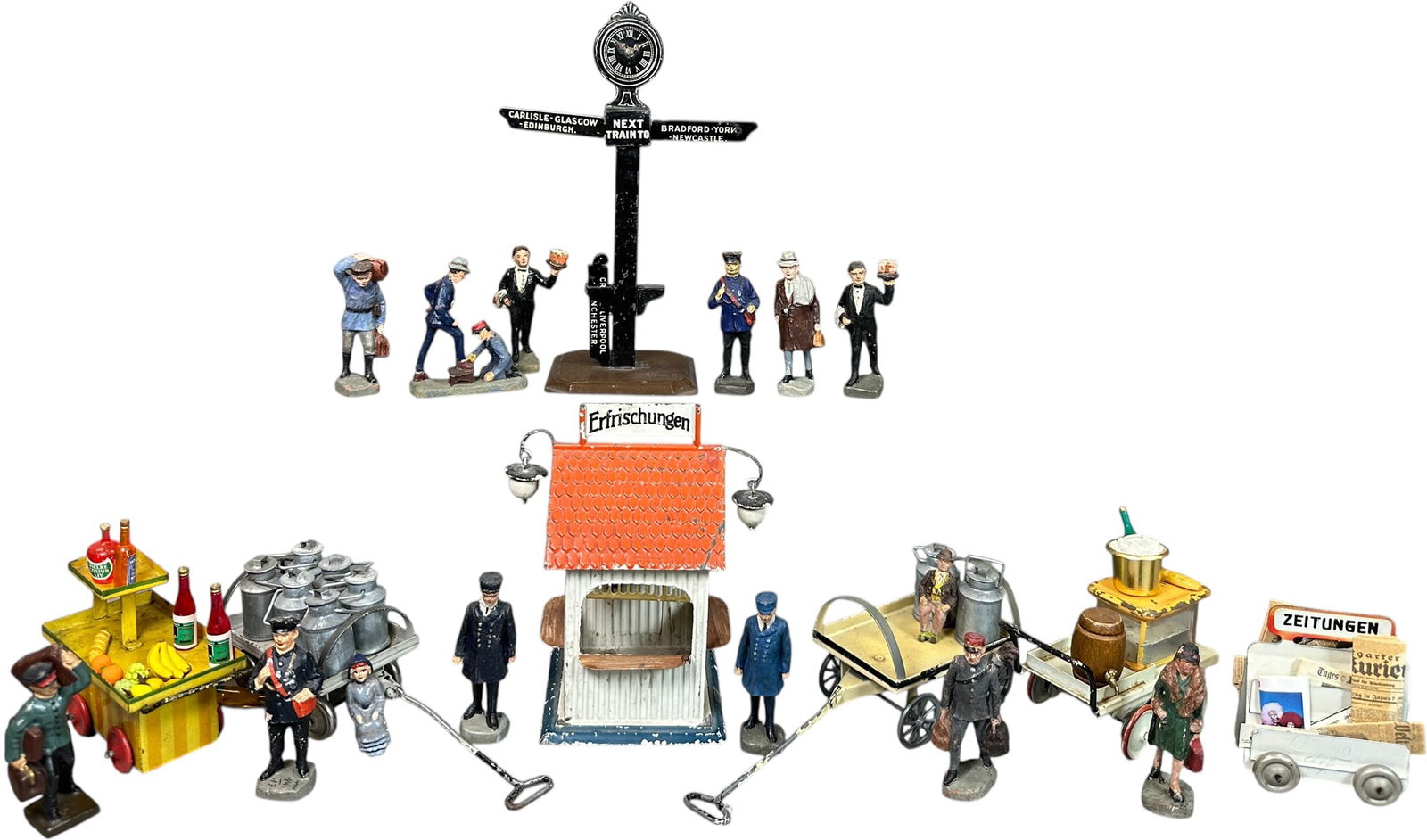 ELASTOLIN 75MM RAILROAD FIGURES: 354. ELASTOLIN 75MM RAILROAD FIGURES | Fourteen 75mm composition in various poses, includes one Lineol and two seated figures for passenger cars or platforms. | 75mm | (Excellent Condition) | $200 - $