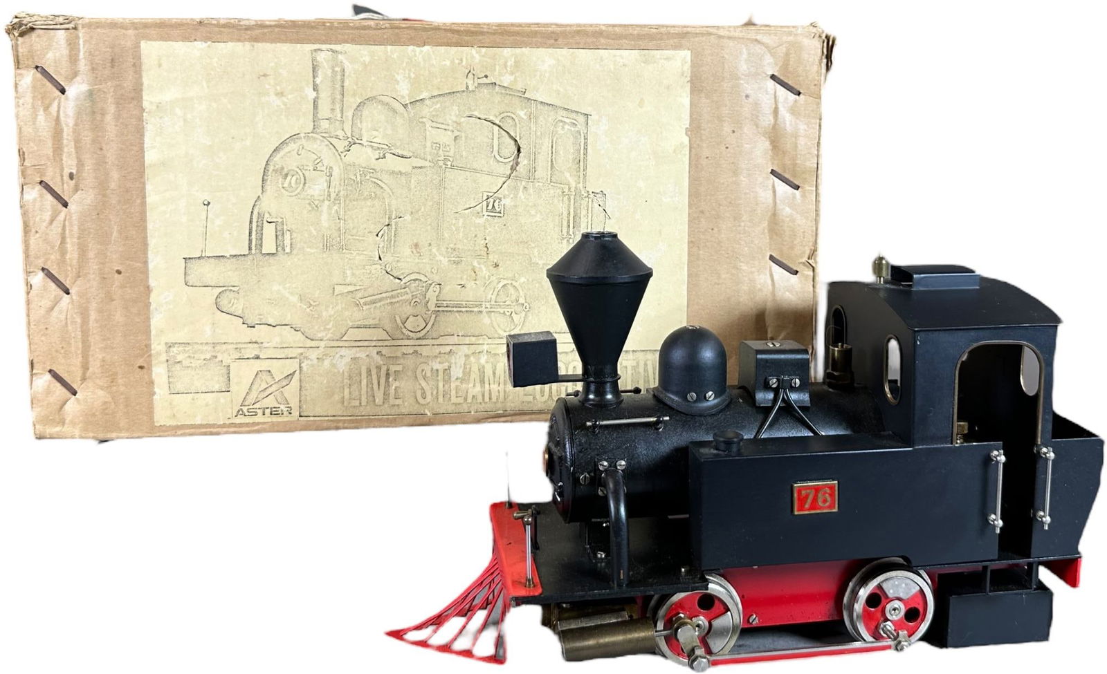 BOXED ASTER NO. 76 LIVE STEAM LOCOMOTIVE: 357. BOXED ASTER NO. 76 LIVE STEAM LOCOMOTIVE | Gauge 1, live steam. | 8" l. loco | (Pristine to Near Mint Condition) | $150 - $300