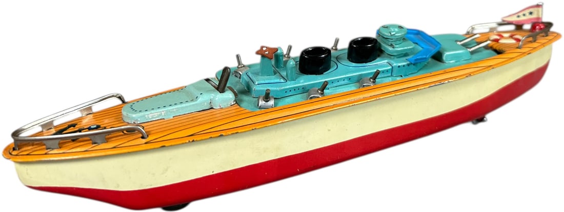 JAPANESE TRANSFORMING BATTLESHIP-CRUISE LINER: 383. JAPANESE TRANSFORMING BATTLESHIP-CRUISE LINER | Friction driven, manual lever turnover of top. | 12" l. | (Excellent to Pristine Condition) | $400 - $800