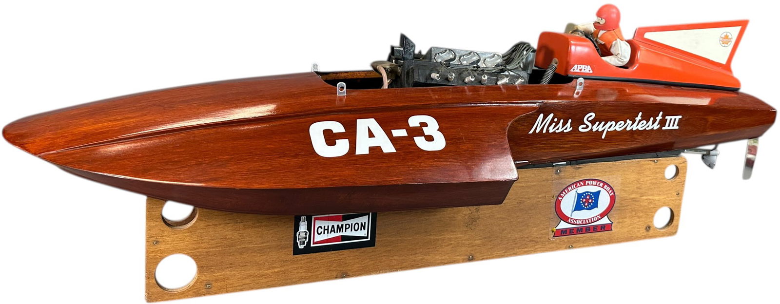 SPEED RECORD SETTING MISS SUPERTEST III SPEEDBOAT: 386. SPEED RECORD SETTING MISS SUPERTEST III SPEEDBOAT | A large wooden hydroplane model replica of the world record breaking Canadian racing boat. Included is original memorabilia from the 1950's and