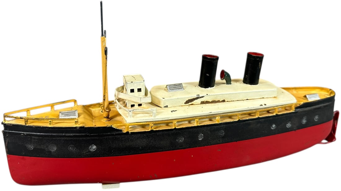 IVES WIND-UP OCEAN LINER: 396. IVES WIND-UP OCEAN LINER | 12.5" l. | Rear mast is missing, hull paint is likely old repaint, displays as (Very Good to Excellent Condition) | $200 - $400