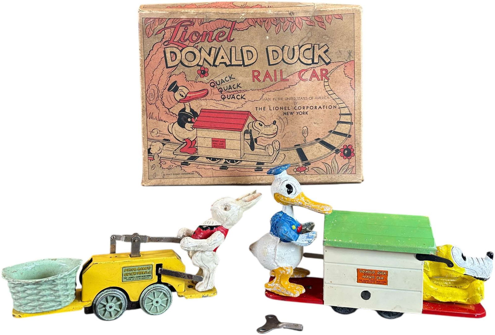 BOXED LIONEL DONALD DUCK & PETER RABBIT RAIL CARS: 403. BOXED LIONEL DONALD DUCK & PETER RABBIT RAIL CARS | 10" l. | Peter Rabbit missing one eye, (Very Good to Excellent Condition) | $250 - $500