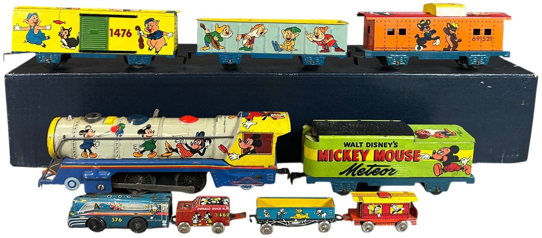 TWO DISNEY TRAINS - MARX LINES METEOR SET (1 of 5)