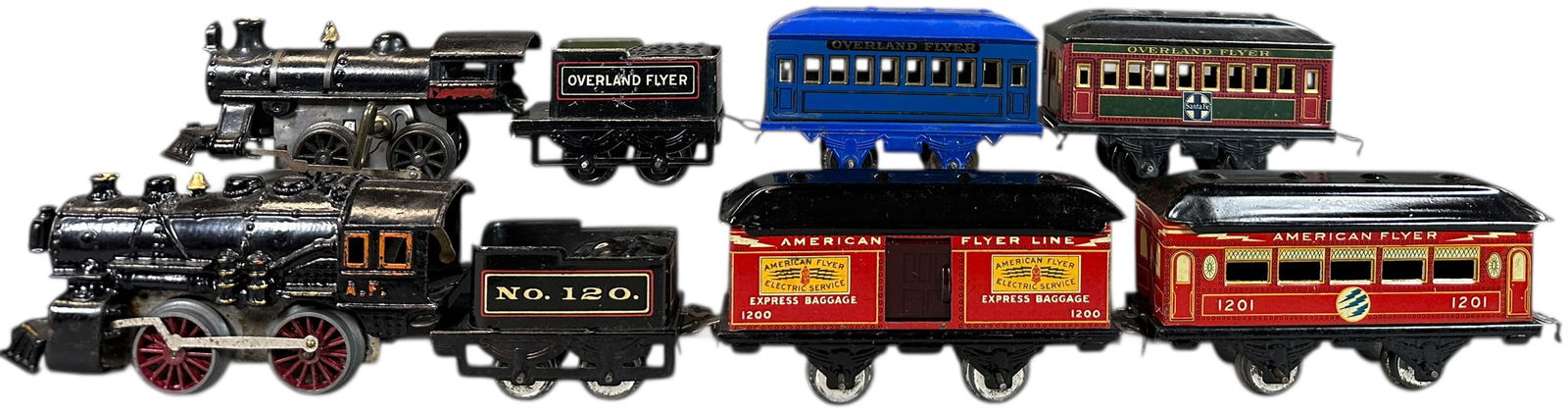 TWO AMERICAN FLYER WIND-UP PASSENGER TRAIN SETS: 407. TWO AMERICAN FLYER WIND-UP PASSENGER TRAIN SETS | O gauge, wind-up. | 7" l. loco | (Excellent Condition) | $300 - $500