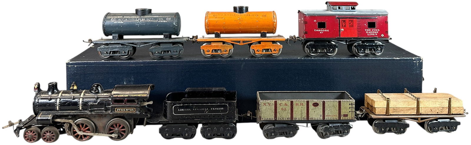 IVES NO.25 FREIGHT TRAIN SET: 409. IVES NO.25 FREIGHT TRAIN SET | O gauge, wind-up. | 8.5" l. loco | (Very Good to Excellent Condition) | $300 - $600