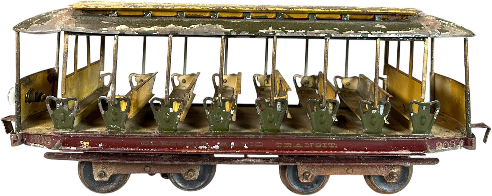 LIONEL NO.303 SUMMER TROLLEY: 413. LIONEL NO.303 SUMMER TROLLEY | Standard gauge, electric. | 15.5" l. | All original with moderate flaking to paint since stabilized, solder reinforced at one wheel hub, (Very Good Condition) | $1,