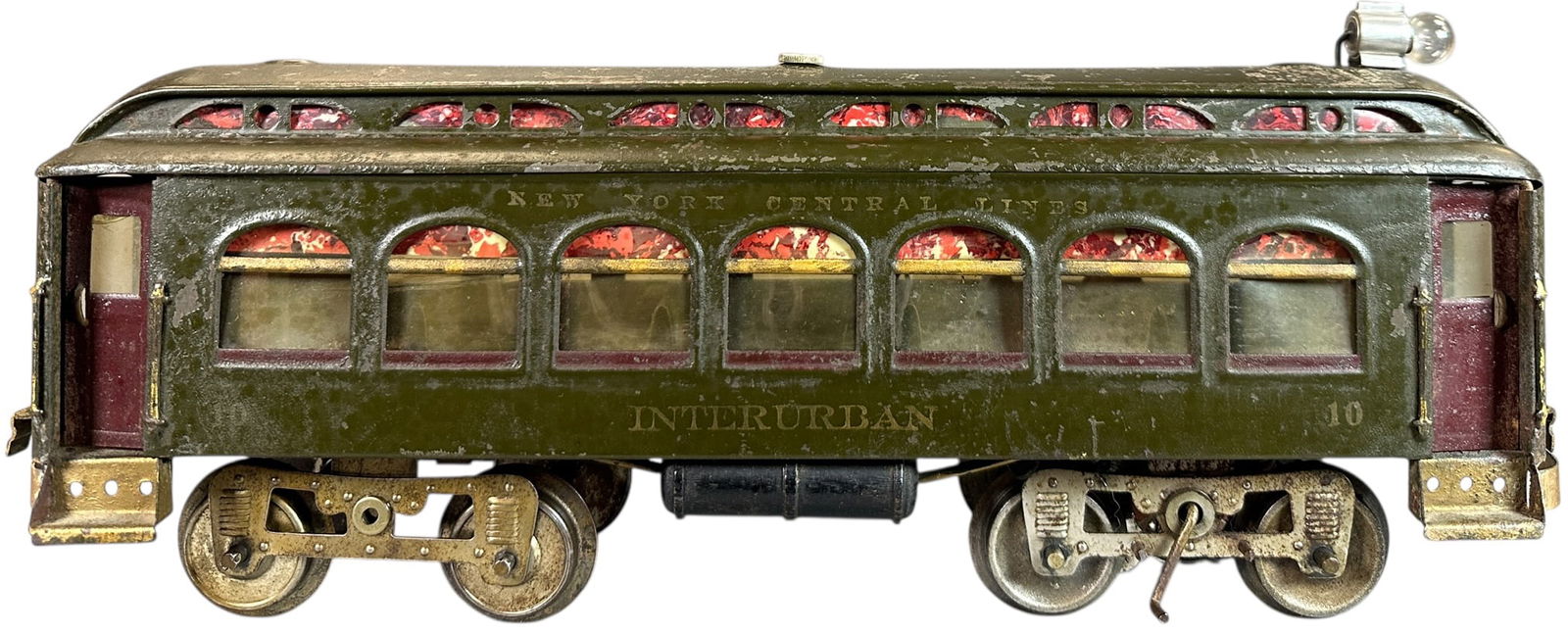 LIONEL INTERURBAN W/ SLIDE ON HEADLIGHT: 424. LIONEL INTERURBAN W/ SLIDE ON HEADLIGHT | Standard gauge, electric. | 15.5" l. | Other than wear to the roof the all original car is in overall (Very Good to Excellent Condition) | $1,000 - $2,00