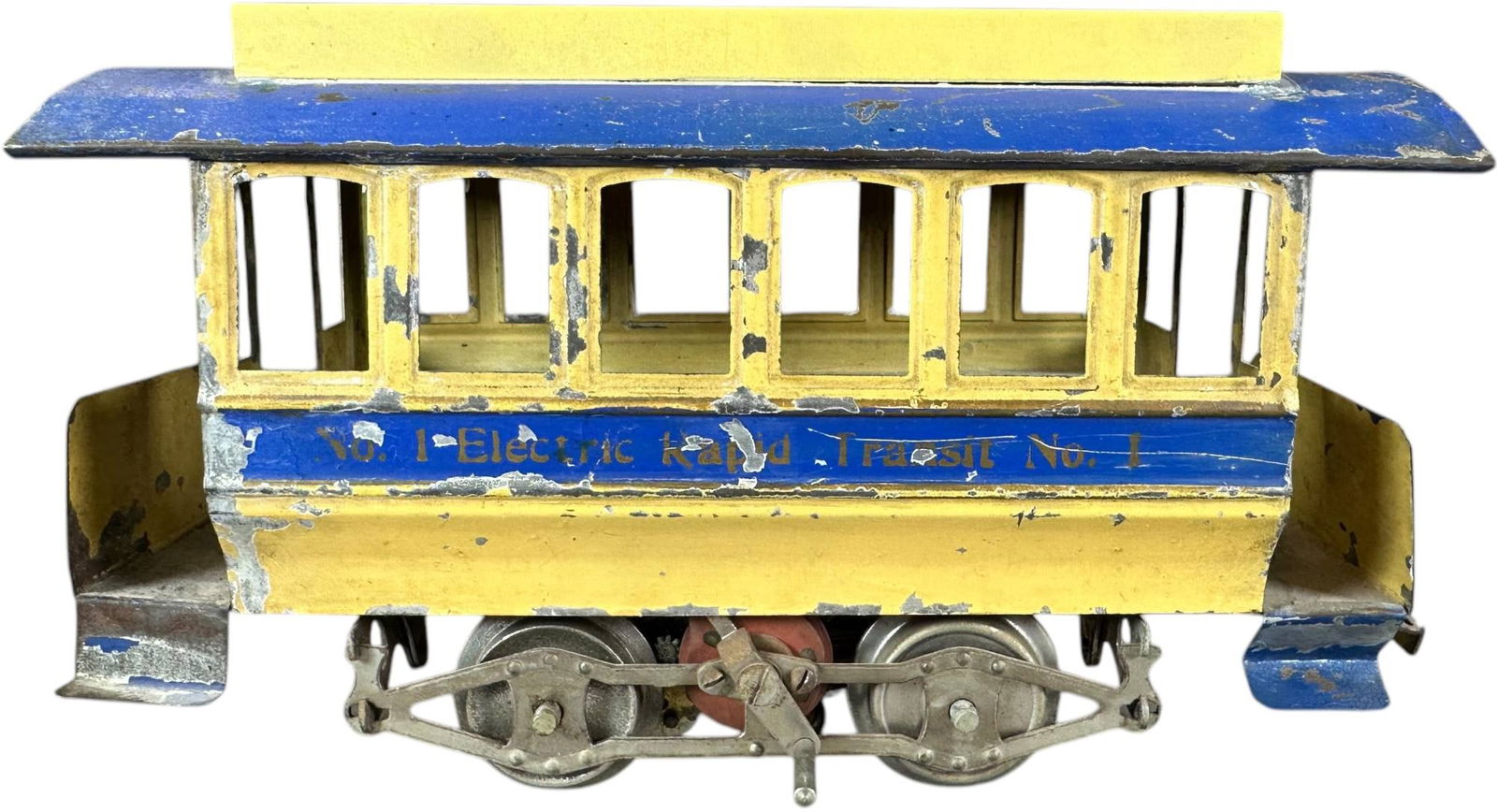 LIONEL NO.1 ELECTRIC TROLLEY W/ REVERSE: 427. LIONEL NO.1 ELECTRIC TROLLEY W/ REVERSE | Standard gauge, electric, six window trolley with reverse switch. | 9.5" l. | Clerestory roof is a replacement, otherwise (Excellent Condition) | $1,000