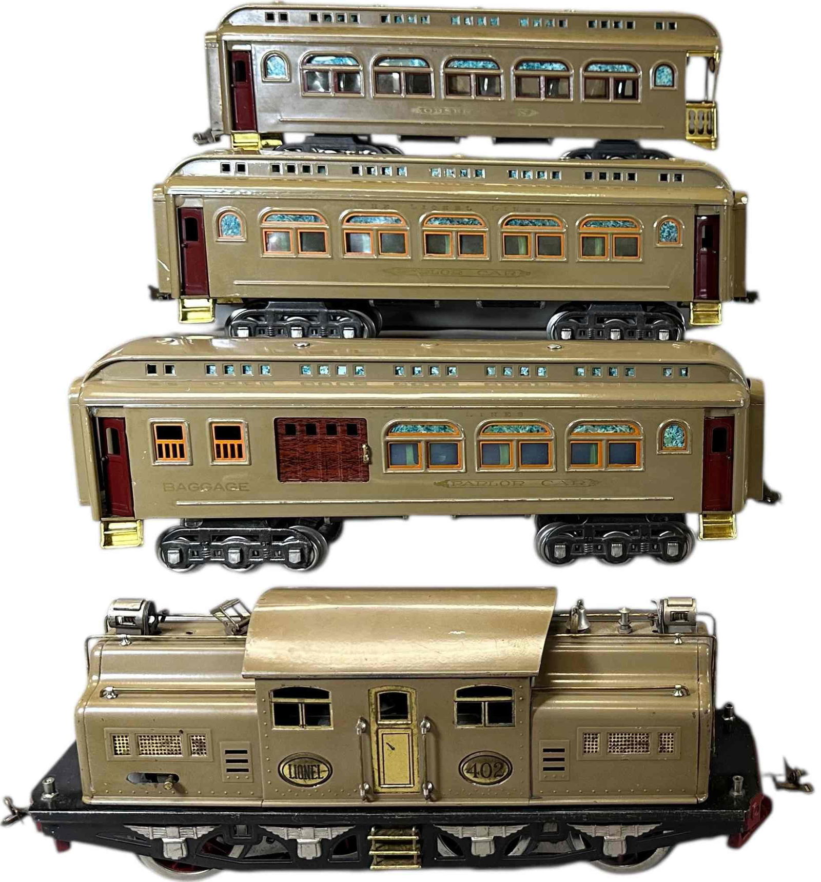 PREWAR LIONEL 402 PASSENGER TRAIN SET: 438. PREWAR LIONEL 402 PASSENGER TRAIN SET | Standard gauge. | 16" l. loco | Four loco wheels replaced, one solder seem at end of loco is coming loose, overall (Excellent to Pristine Condition) | $700