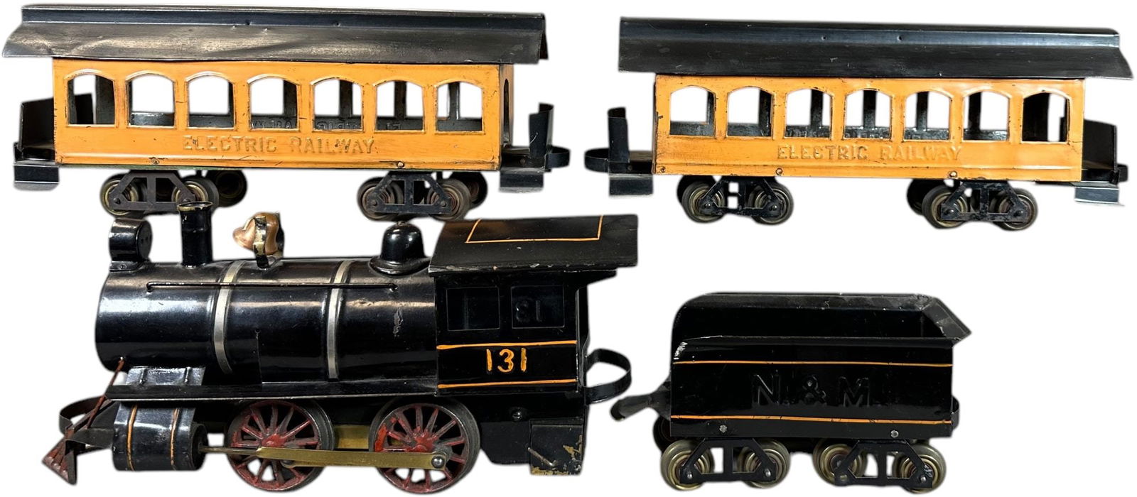 CARLISLE & FINCH PASSENGER TRAIN SET: 453. CARLISLE & FINCH PASSENGER TRAIN SET | 2" gauge, electric, painted cars with embossed sides. | 12" l. loco | Impressive loco paint has some clearcoat stabilization, one loco axle broken, coaches