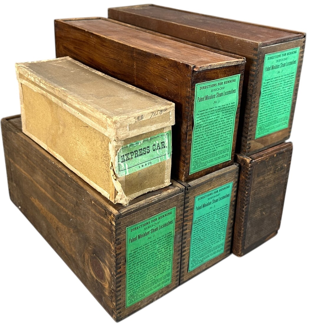 ORIGINAL BEGGS LIVE STEAM TRAIN BOXES: 458. ORIGINAL BEGGS LIVE STEAM TRAIN BOXES | Empty boxes with paper labels. | 18.5" l. | Four green labels replaced, otherwise (Excellent Condition) | $300 - $600