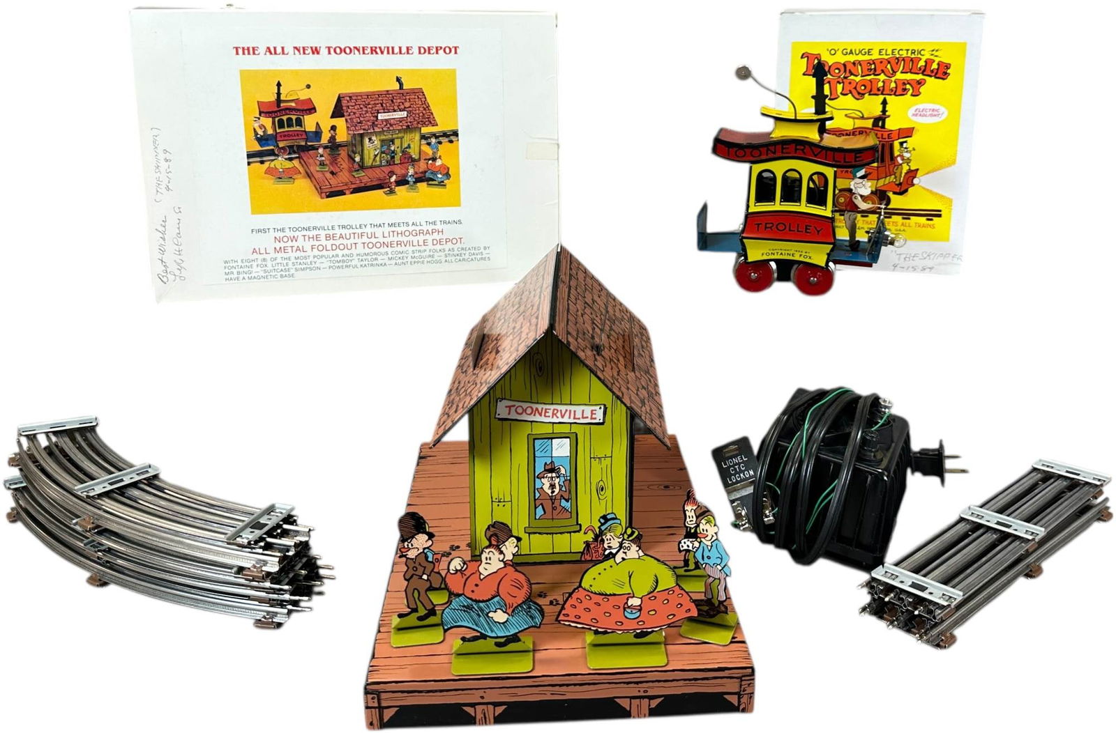 PRIDE LINES TOONERVILLE TROLLEY & STATION: 460. PRIDE LINES TOONERVILLE TROLLEY & STATION | Contemporary, O scale electric trolley and litho building. | 6.5" h. trolley | (Pristine to Near Mint Condition) | $250 - $500