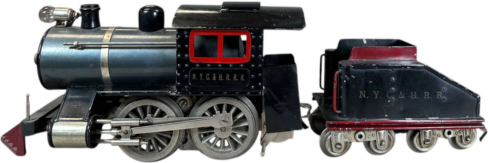 LIONEL NO.5 LOCOMOTIVE & TENDER: 468. LIONEL NO.5 LOCOMOTIVE & TENDER | Standard gauge, electric, thick rim version with matching tender. | 11.5" l. loco | (Excellent to Pristine Condition) | $800 - $1,400