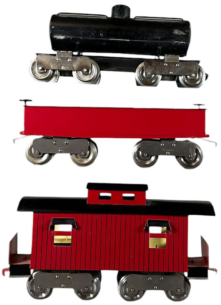 LIONEL 10 SERIES CARS: 491. LIONEL 10 SERIES CARS | Standard gauge, early 10 series cars with solid frame trucks. Provenance: Bradley Kaplan Collection. | 11.5" l. | Repainted, one pair of trucks are reproductions, others o