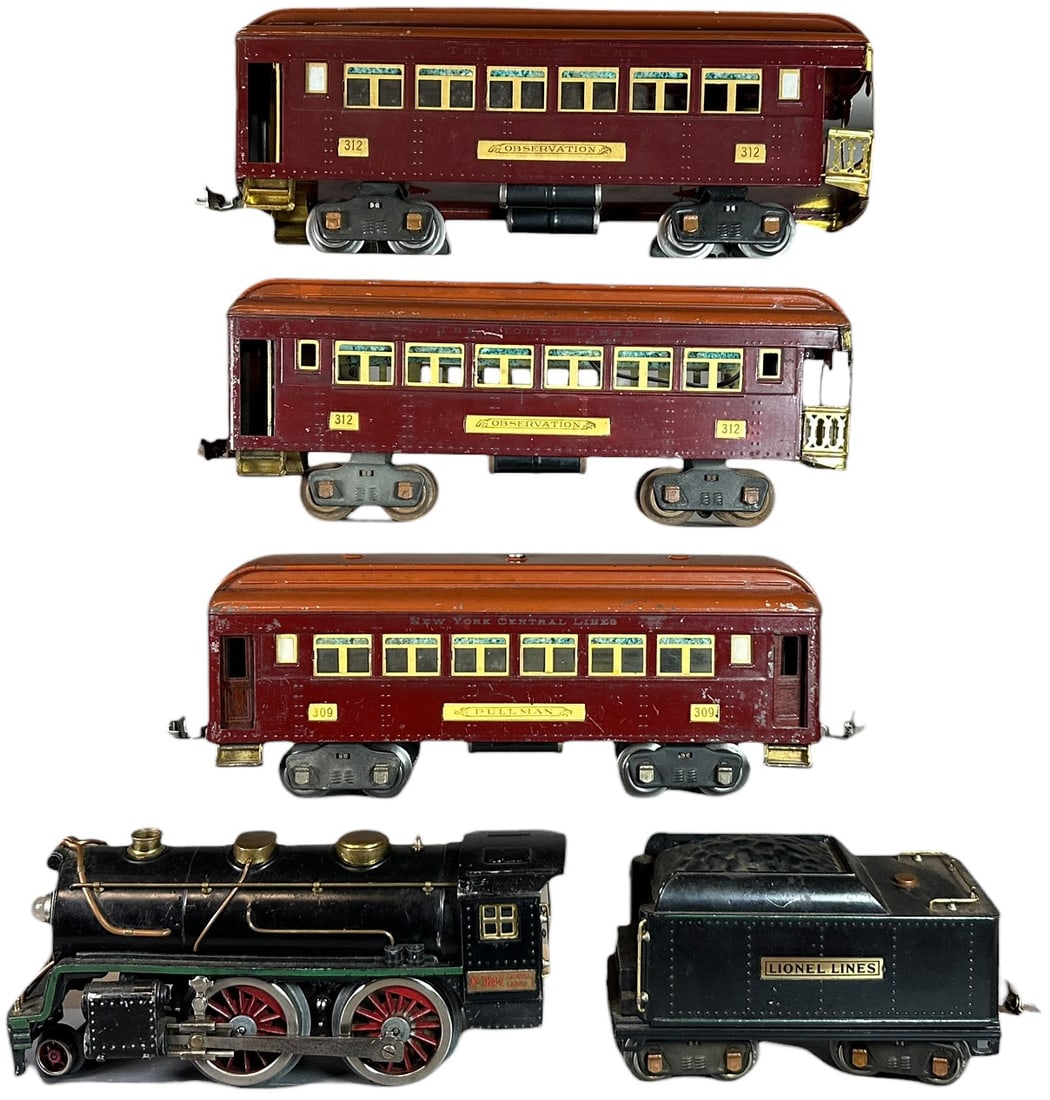 LIONEL 384E PASSENGER TRAIN SET: 494. LIONEL 384E PASSENGER TRAIN SET | Standard gauge. | 11.5" l. loco | One valve rod broken, bubble wrap marks to car roofs, (Very Good Condition) | $250 - $500