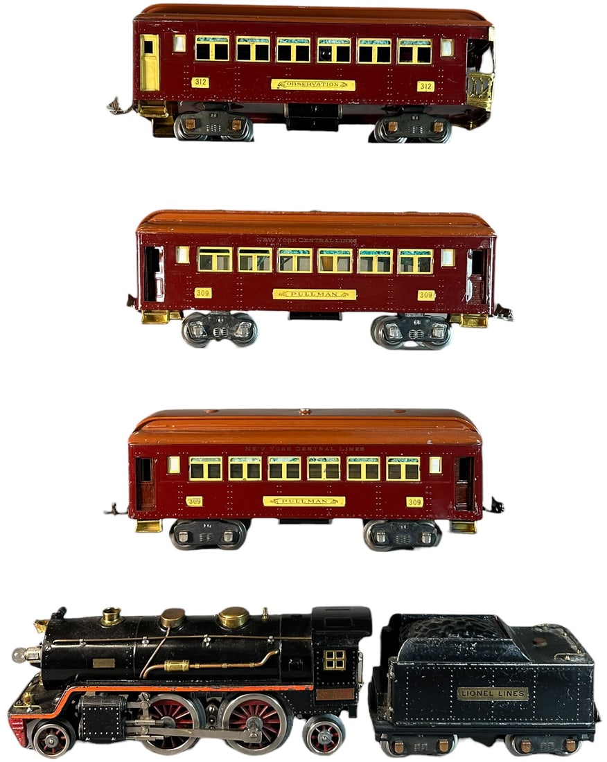 LIONEL 390E W/ PASSENGER CARS: 498. LIONEL 390E W/ PASSENGER CARS | Standard gauge. | 11.5" l. loco | Bubble wrap marks to one car roof, otherwise (Very Good to Excellent Condition) | $300 - $600