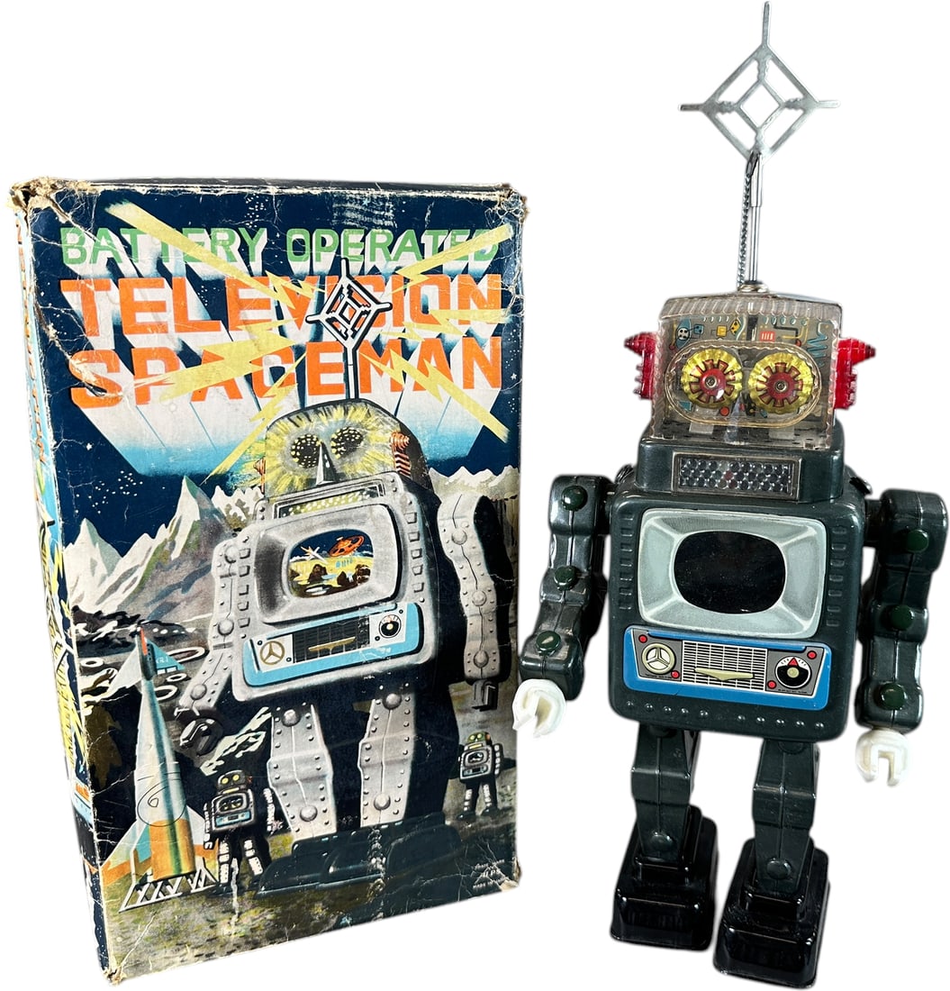 BOXED ALPS TELEVISION SPACEMAN V1: 1004. BOXED ALPS TELEVISION SPACEMAN V1 | Japan, battery-operated action, push antenna into top of helmet to activate. | 11" h. | Box with insert has some professional glue repairs and tape (Very
