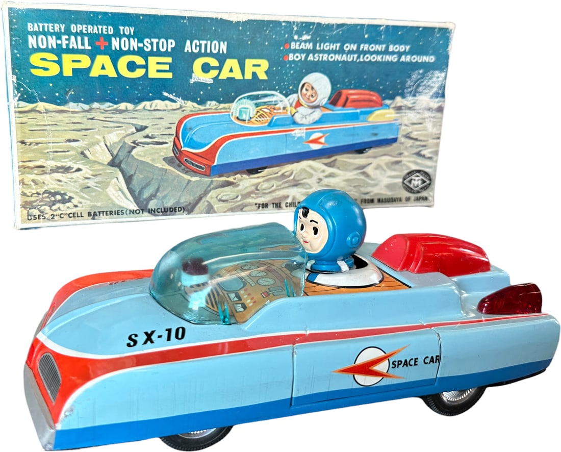 BOXED MASUDAYA SPACE CAR SX-10: 1017. BOXED MASUDAYA SPACE CAR SX-10 | Japan, battery-operated action. | 9.5" l. | (Pristine Condition) | $400 - $600