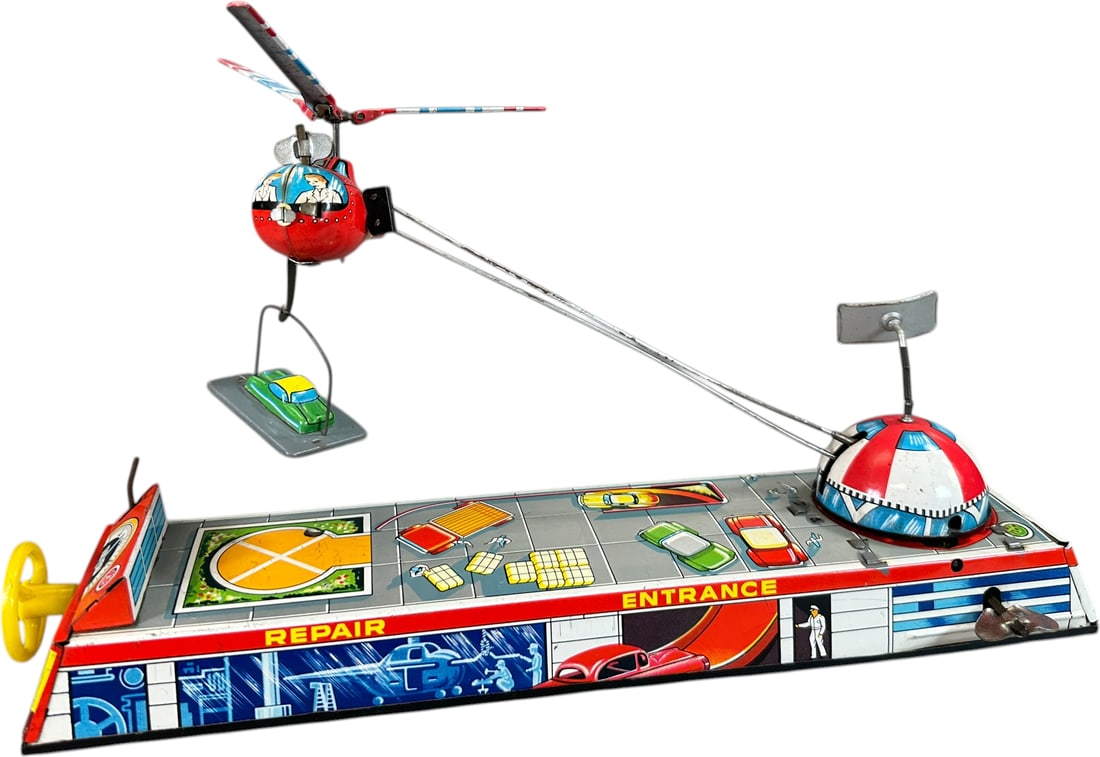 TPS HELICOPTER AIR TRANSPORT: 1026. TPS HELICOPTER AIR TRANSPORT | Japan, wind-up driven. Provenance: Bill Gallagher Collection. | 12" l. | Complete and original, (Excellent Condition) | $300 - $500