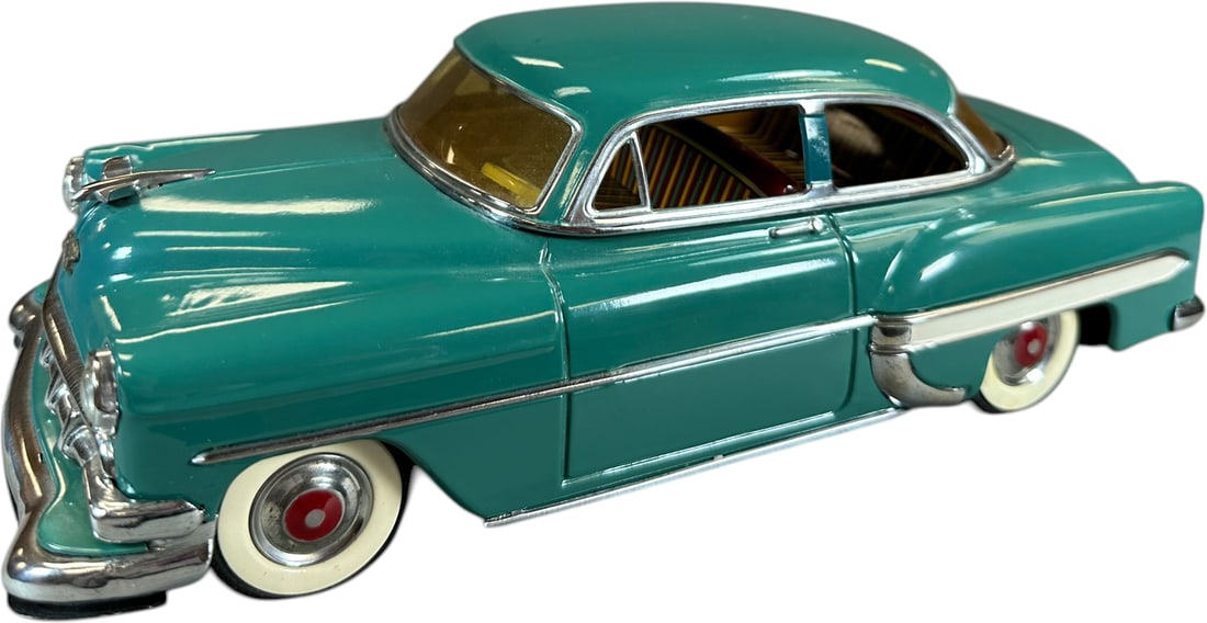 MARUSAN 1954 CHEVROLET TWO-DOOR SEDAN: 1059. MARUSAN 1954 CHEVROLET TWO-DOOR SEDAN | Japan, friction driven motor. | 10.5" l. | Restored car and bottom is replaced, body displays as (Pristine to Near Mint Condition) | $400 - $700