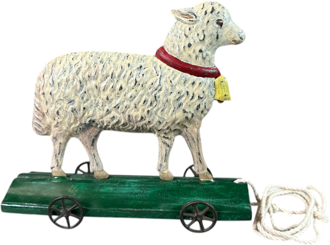GEORGE BROWN AMERICAN TIN SHEEP ON PLATFORM: 1392. GEORGE BROWN AMERICAN TIN SHEEP ON PLATFORM | Provenance: The Maloy Collection. | 7" l. | Restored, displays as (Very Good to Excellent Condition) | $200 - $400