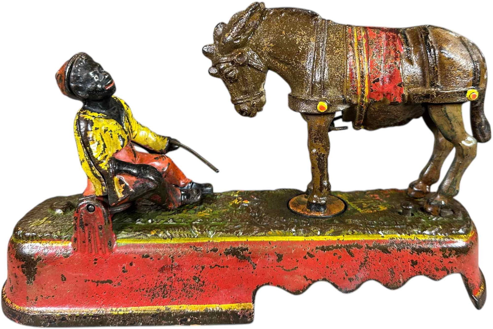SPISE A MULE MECHANICAL BANK: 1398. SPISE A MULE MECHANICAL BANK | J&E Stevens Co. | CULTURAL DISCLAIMER: Certain antique and vintage items in this sale include imagery or themes that reflect racial stereotypes now recognized as o