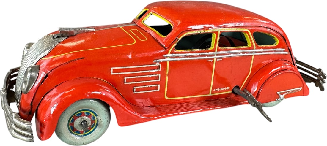 LARGE KURAMOCHI 1936 CHRYSLER AIRFLOW: 13. LARGE KURAMOCHI 1936 CHRYSLER AIRFLOW | Japan. Working wind-up motor. Provenance: Ira Bernstein Collection. | 8.5" l. | Nicely blended touch-up in areas, displays in (Excellent Condition) | $400 -