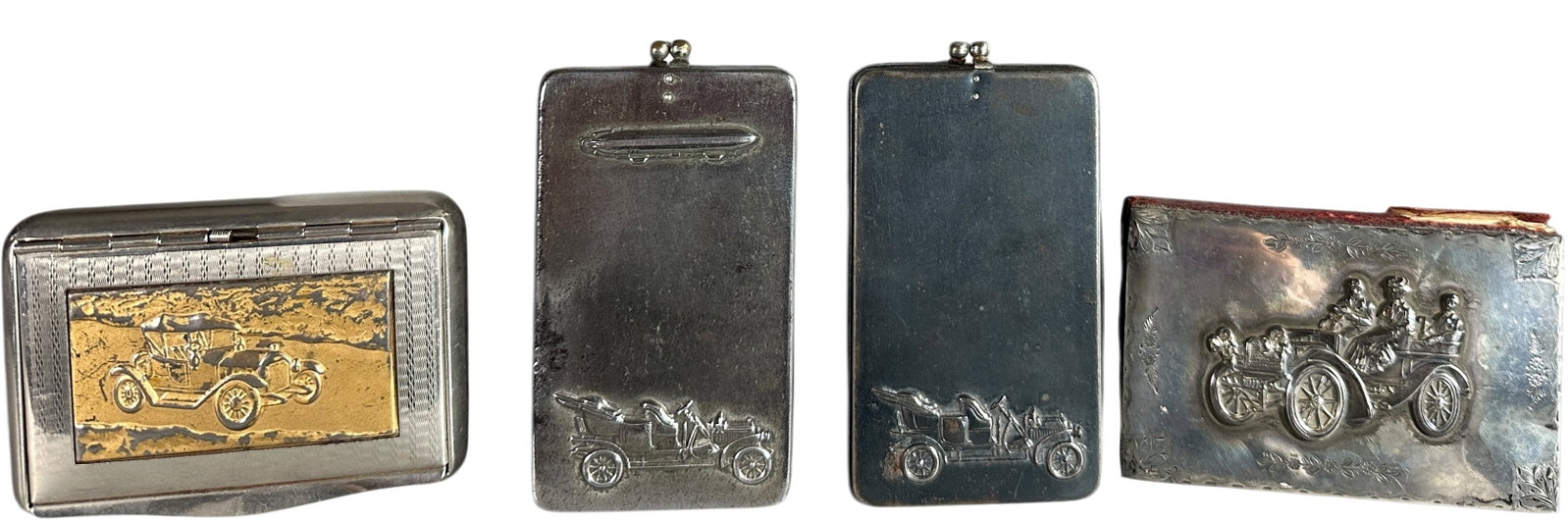 FOUR AUTOMOBILIA PERSONAL ITEMS (1 of 6)