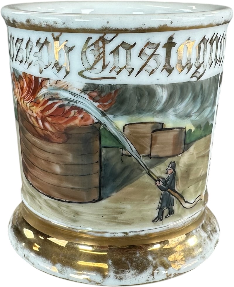 FIRE FIGHTER OCCUPATIONAL SHAVING MUG: 217. FIRE FIGHTER OCCUPATIONAL SHAVING MUG | 3.75" h. | Moderate gold loss to base, strong imagery, free from damage, (Excellent Condition) | $200 - $300