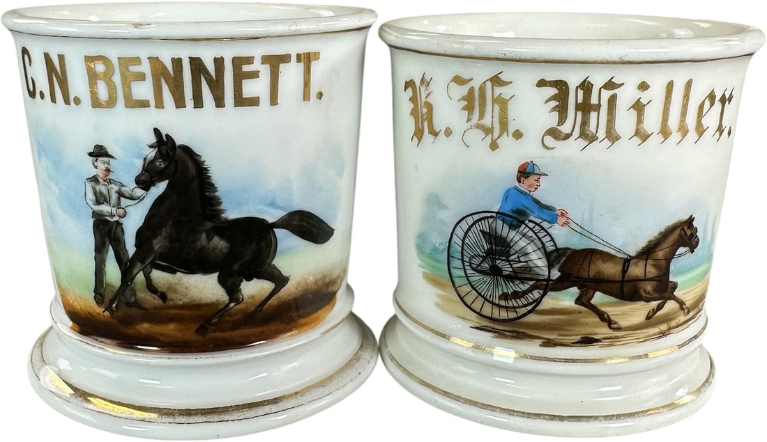 TWO HORSE OCCUPATIONAL SHAVING MUGS: 230. TWO HORSE OCCUPATIONAL SHAVING MUGS | Occupational shaving mugs were personalized for regular patrons and kept at the barber shop for repeated use. Hand-painted scenes identifying the owner's