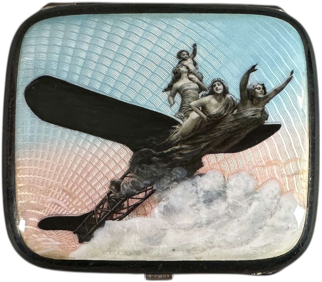 ENAMELED AVIATION CIGARETTE CASE: 238. ENAMELED AVIATION CIGARETTE CASE | Spectacular Silver plated metal enameled aviation panel with gold washed interior. From the David Bausch Automobilia Collection. | 3.5" l. | Exceptional graphic