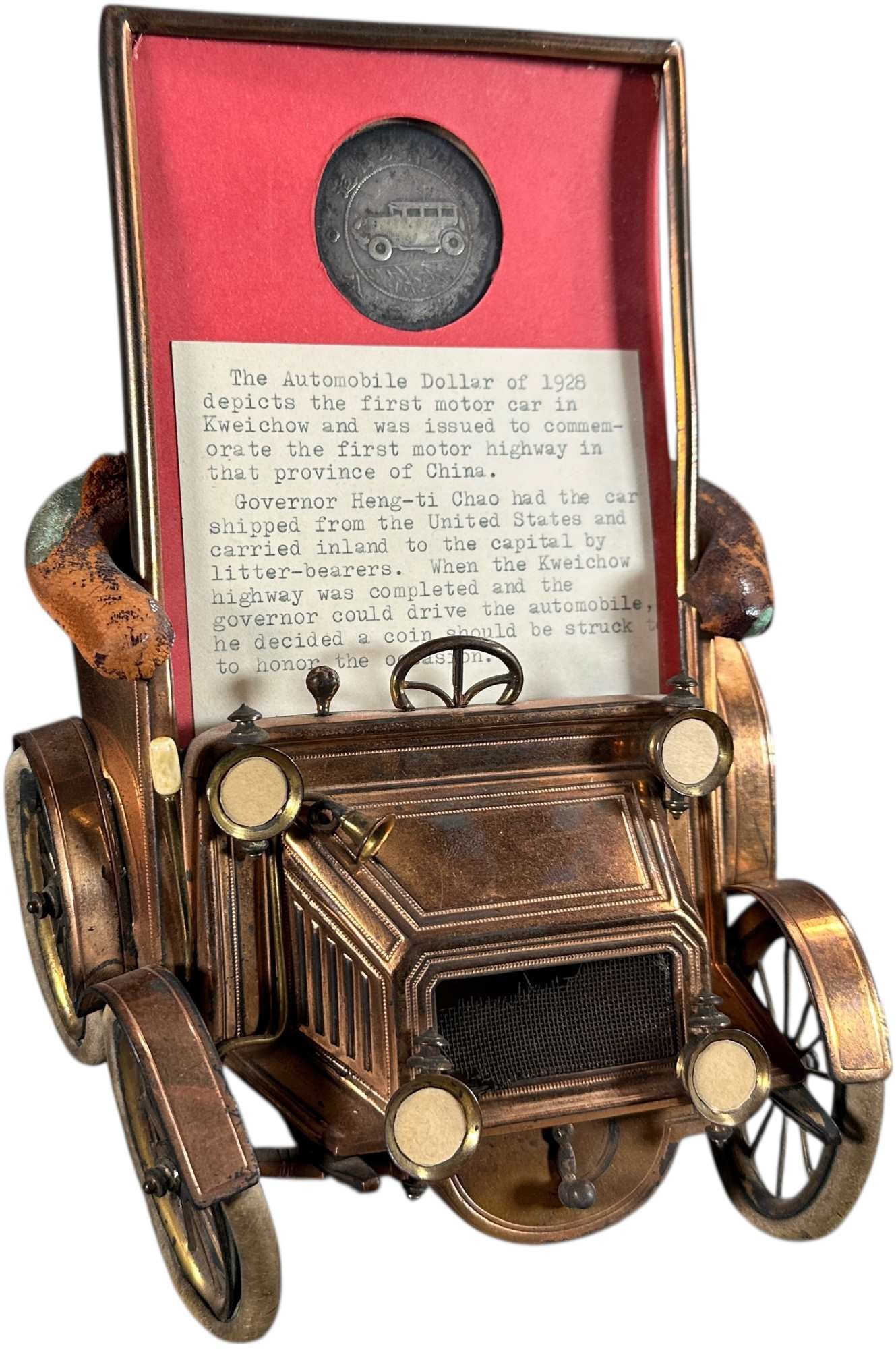 1928 COPPER AUTOMOBILE COIN DISPLAY STAND. (1 of 5)