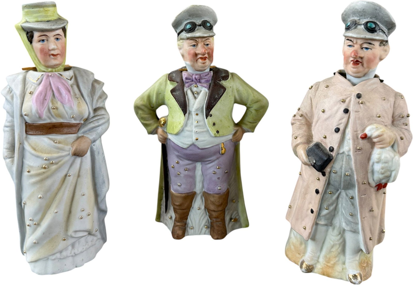 GERMAN AUTOMOBILE CHAUFFER FIGURINES: 347. GERMAN AUTOMOBILE CHAUFFER FIGURINES | From the David Bausch Automobilia Collection. | 7.5" h. | Overall (Excellent Condition) | $400 - $700