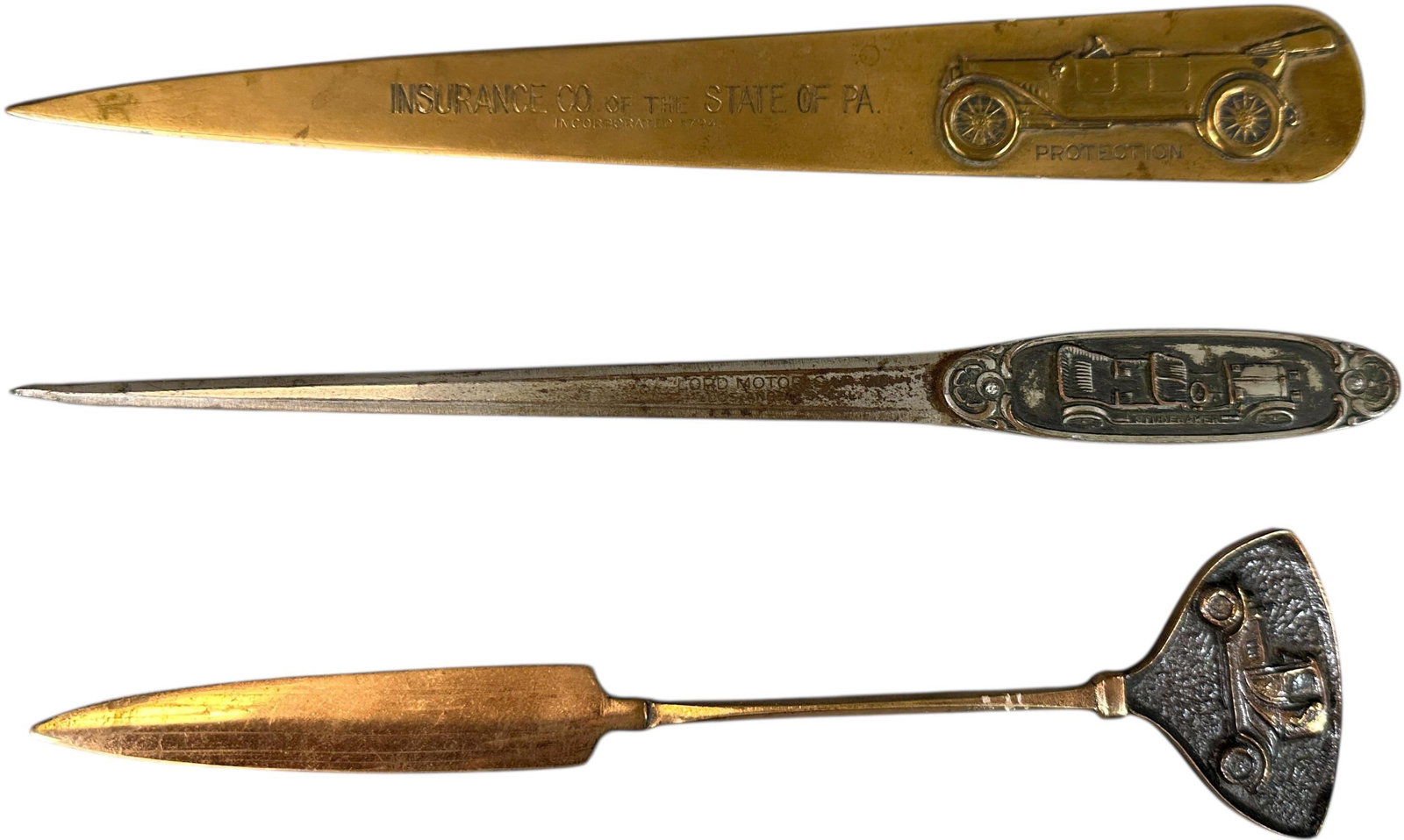 THREE AUTOMOBILE LETTER OPENERS (1 of 4)