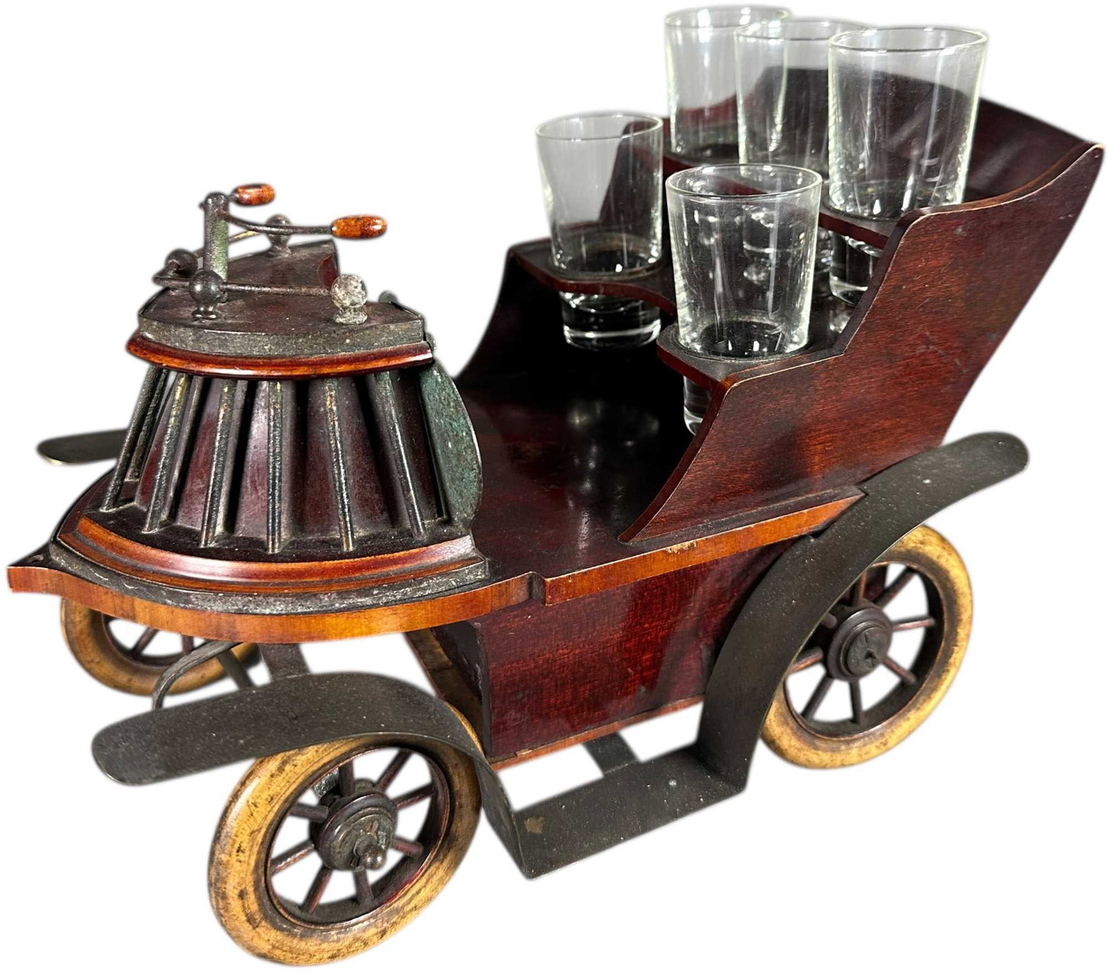WOOD AUTOMOBILE MUSIC BOX BAR ACCESSORY: 366. WOOD AUTOMOBILE MUSIC BOX BAR ACCESSORY | An unusual novelty cocktail bar accessory, this charming early wooden automobile serves both as a music box and shot glass caddy, featuring a hand cranke