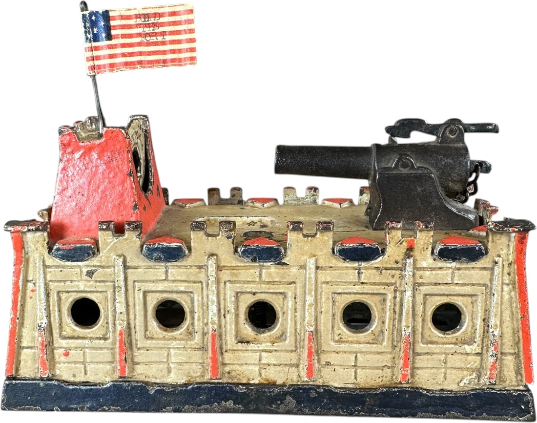 HOLD THE FORT MECHANICAL BANK: 7. HOLD THE FORT MECHANICAL BANK | Manufacturer is unknown, designed by Samuel Clark, exciting action as coin is placed on target and cannon literally shoots a cannonball to make deposit. Provenance: 
